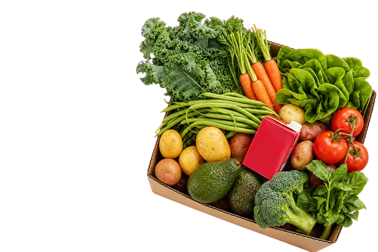 A box of fresh vegetables and groceries